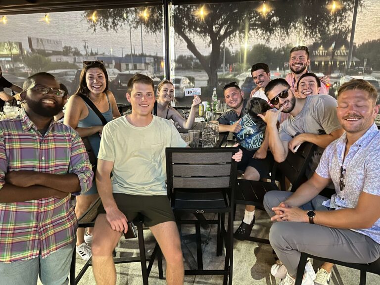 The Brass Tap Tampa FL 33609 trivia night: group of young adults on an outside screened-in patio